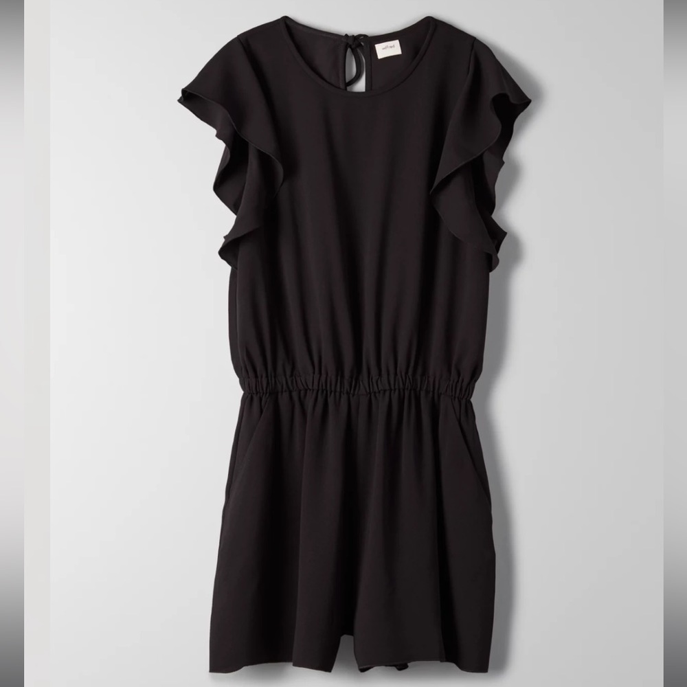 Aritzia Wilfred Fleurette Black Romper w/ Ruffle Detail and Open Back size Large